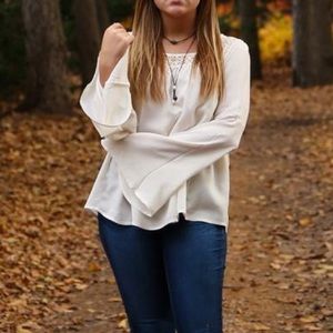 Bell sleeve top with lace detailing